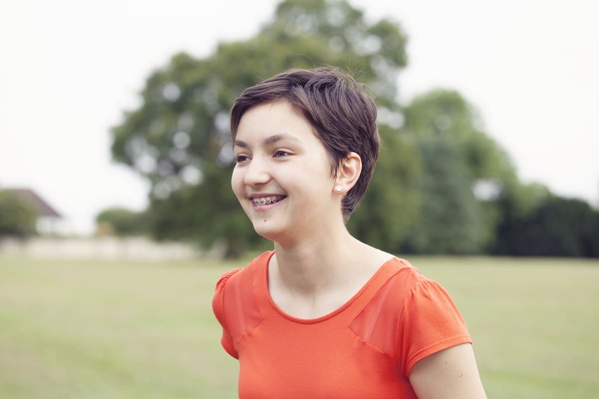 teen with braces Phoenix