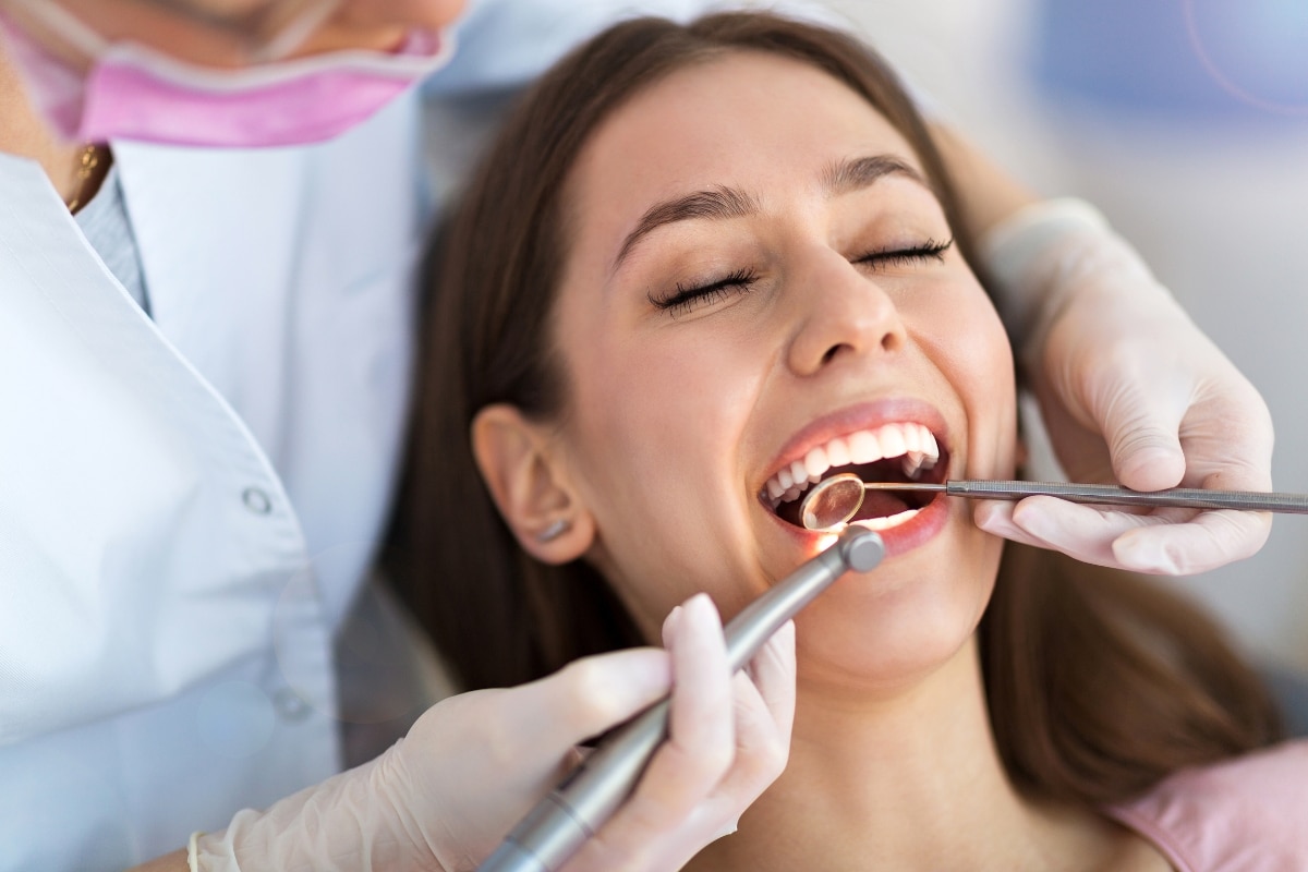 Dentist performing dentistry