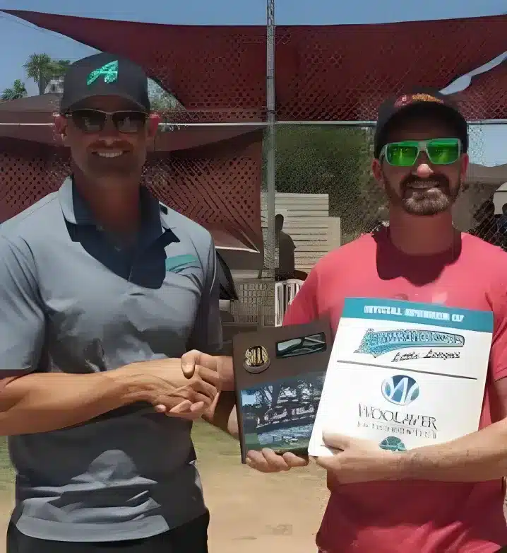 Two men shaking hands and flashing a certificate of appreciations