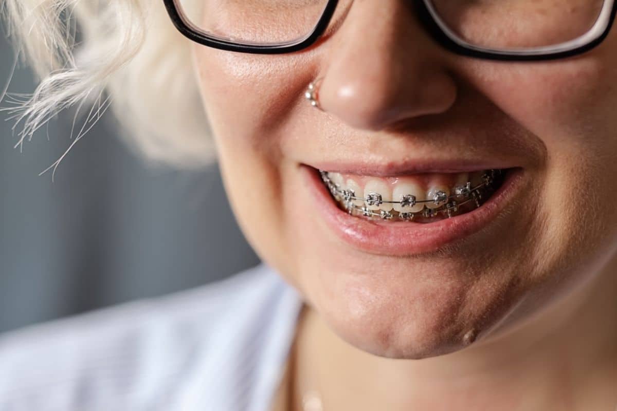 elderly person wearing braces